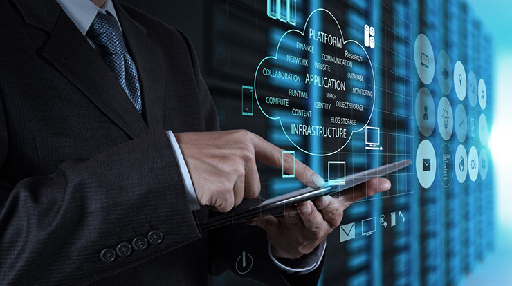man in business suit on phone in data center